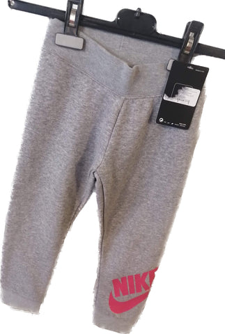 Jogging Nike junior rose dans le bas des jambe